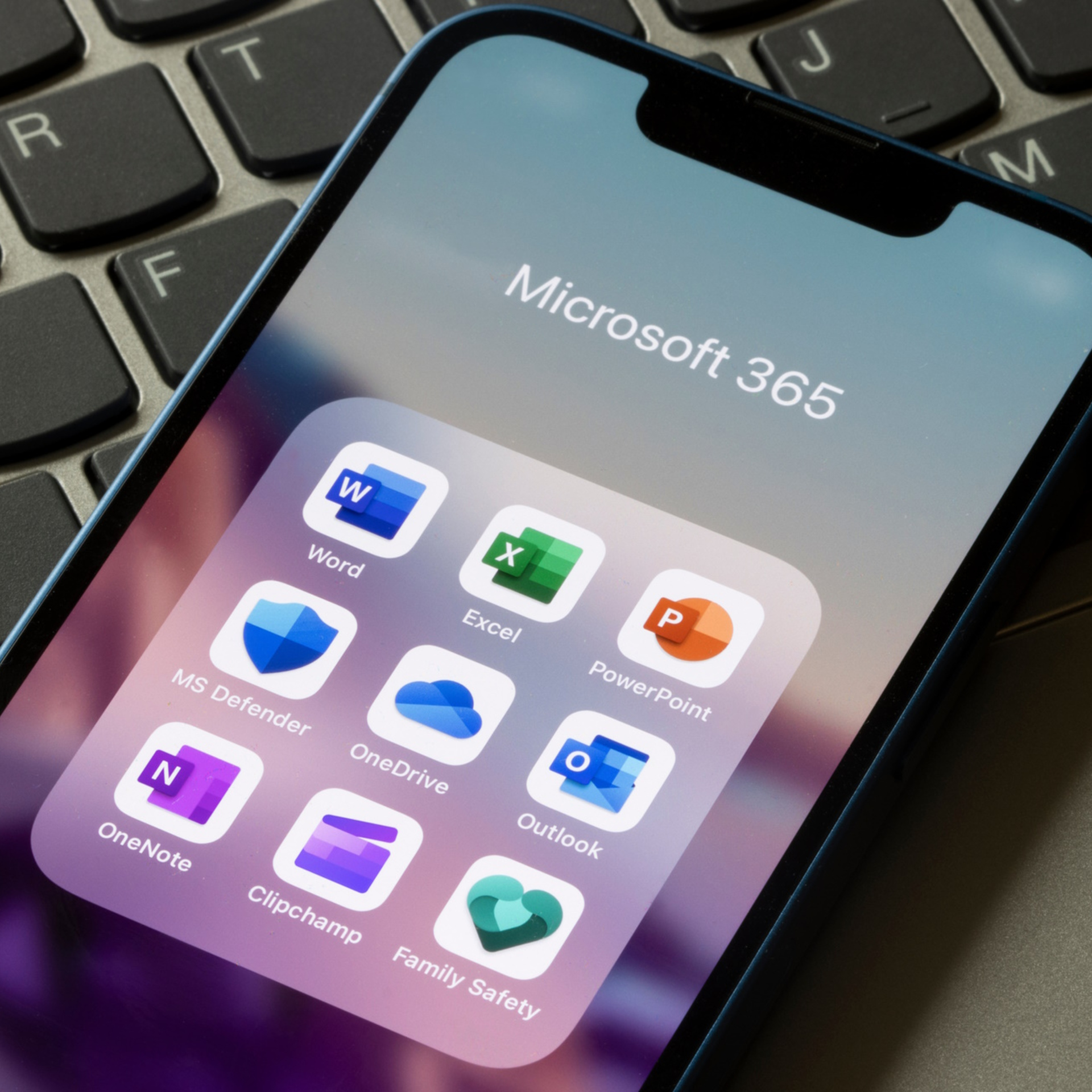 Portland, OR, USA - Dec 7, 2022: Apps included in the Microsoft 365 Family plan are seen on an iPhone - Word, Excel, PowerPoint, Defender, OneDrive, Outlook, OneNote, Clipchamp, and Family Safety.